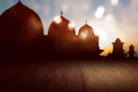 Silhouette of the mosque with blurred light backgroundの写真素材
