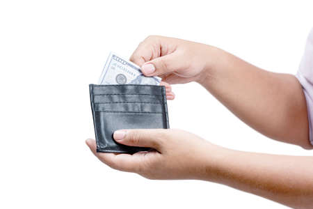 A human hand getting money out of his wallet isolated over white background