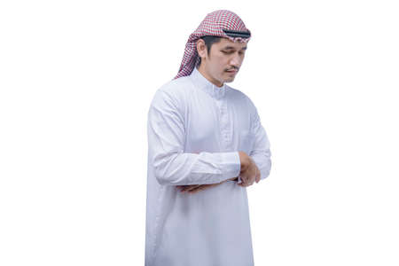 Muslim man with keffiyeh with agal in praying position (salat) isolated over white backgroundの写真素材
