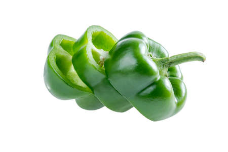 Sliced green peppers isolated over white backgroundの写真素材