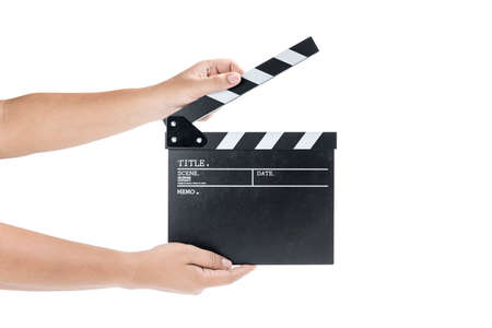 Human hand holding black clapper board isolated over white backgroundの写真素材