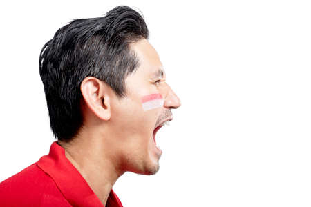 Indonesian men celebrate Indonesian independence day on 17 August with excited expressions isolated...