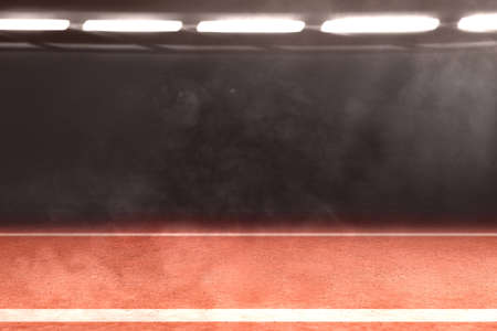 Running track with a spotlight on the stadiumの写真素材