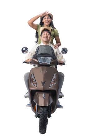Asian couple with a hat sitting on a scooter isolated over white backgroundの写真素材
