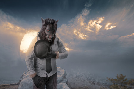 A werewolf on the field with dramatic scene background. Halloween concept