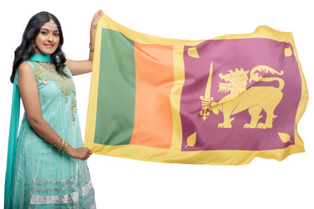 Woman holding the Sri Lanka flag isolated over white background