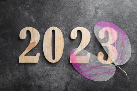 2023 with a black background. Happy New Year 2023