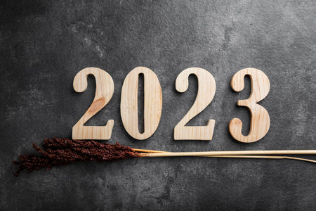 2023 with a black background. Happy New Year 2023の写真素材
