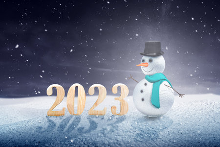 2023 with a snowman on the snow field. Happy New Year 2023