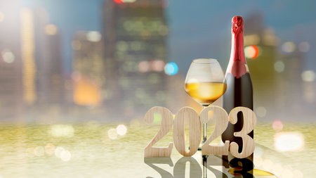 2023 and champagne with blurred light background. Happy New Year 2023