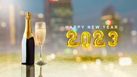 2023 and champagne with blurred light background. Happy New Year 2023