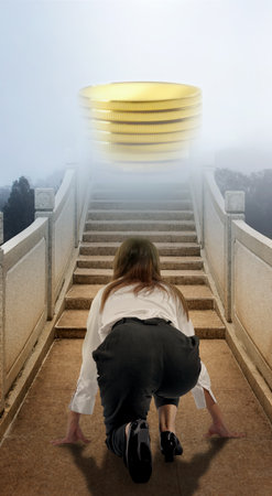 Asian businesswoman in start position ready to run on the bridge with coins and sky backgroundの写真素材