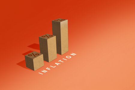 Increased interest rate graph with inflation sign on a colored backgroundの写真素材