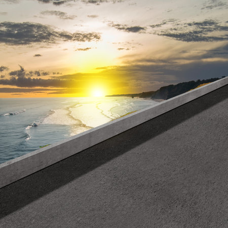 Asphalt road with ocean view and sunset sky background