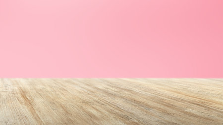 Wooden floor with colored wall backgroundの写真素材