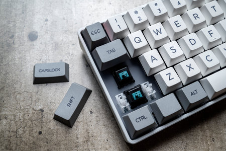The mechanical keyboard on textured background
