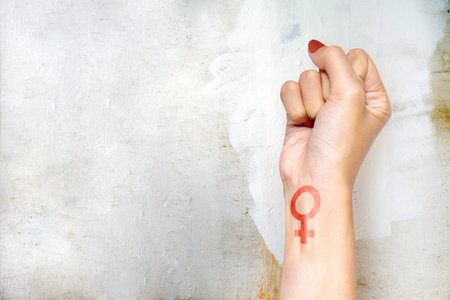 Woman hand with female symbol. International Women Dayの写真素材