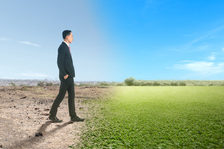 Asian businessmen walk on the ground in different conditions. Earth Day Concept