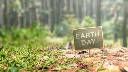 Wooden board with Earth Day message on the ground. Earth Day Conceptの写真素材