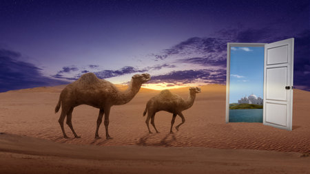 Camel crossing the desert with mosque and blue sky backgroundの写真素材