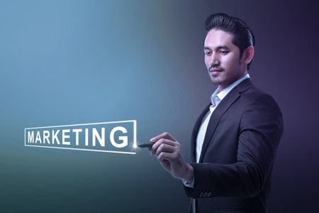 Asian Businessman with a pen and marketing text with colored backgroundの写真素材