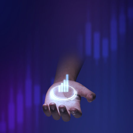 Human hand showing graph on virtual screen on a colored backgroundの写真素材