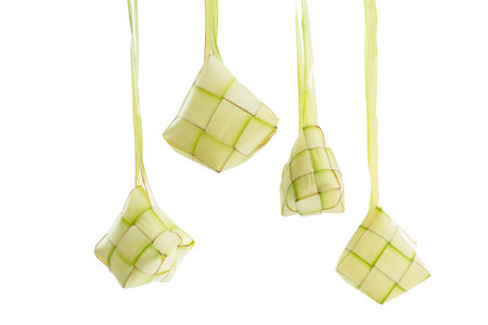 Ketupat (Rice Dumpling) is a traditional food of Indonesia during eid al fitr on white backgroundの写真素材