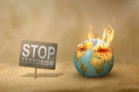 Stop terrorism sign on wooden board with burnt earthの写真素材