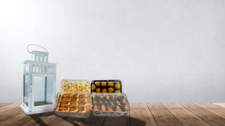 Assorted Indonesian cookies to celebrate eid al fitr (Kue Lebaran) on a colored backgroundの写真素材