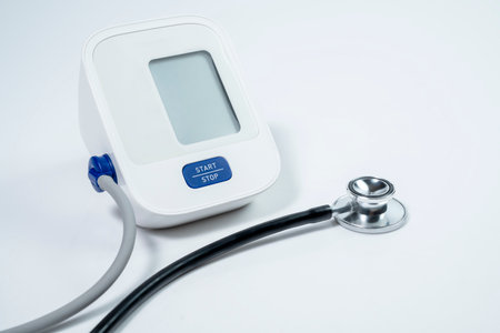 Digital monitor for measuring blood pressure on white backgroundの写真素材