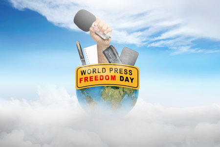 Human hand holding a microphone. World press freedom day conceptの写真素材