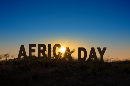Africa day text on the field with sunrise scene background. Africa day conceptの写真素材