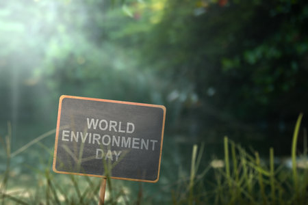 Wooden board with World environment day message on the ground. World environment day conceptの写真素材