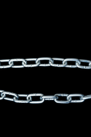 Chain of metal steel on black backgroundの写真素材