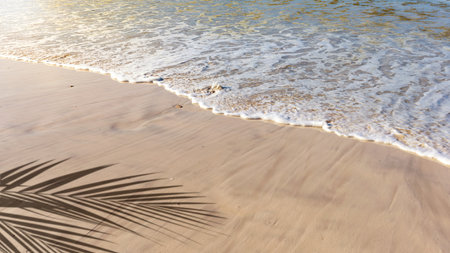 Ocean water waves on the sandy beach. Nature backgroundの写真素材