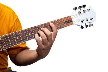 Man playing guitar isolated over white backgroundの写真素材