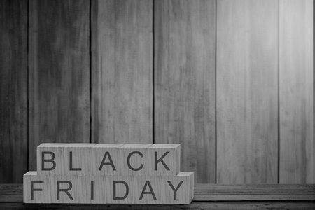 Wooden cube with Black Friday text. Black Friday conceptの写真素材