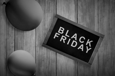 Black balloon and blackboard with Black Friday text. Black Friday conceptの写真素材