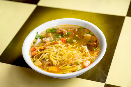 Chicken soup (Soto Ayam) is street food on Suryakencana Street. Traditional Indonesia food