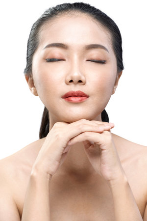 Portrait of Asian beauty woman isolated over white backgroundの写真素材