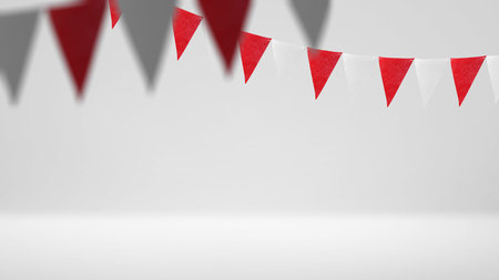 Indonesian flag hanging with ropes with white wall backgroundの写真素材