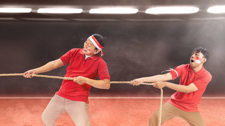 Indonesian people celebrate Indonesian independence day on 17 August with the tug of war contest....