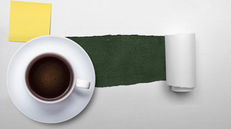 Cup of coffee with empty paper on torn paper background. International coffee day conceptの写真素材