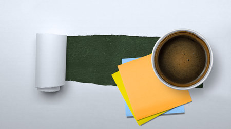 Cup of coffee with empty paper on torn paper background. International coffee day conceptの写真素材