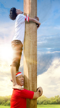 Indonesian people celebrate Indonesian independence day on 17 August with a climb competition. Indonesian independence dayの写真素材