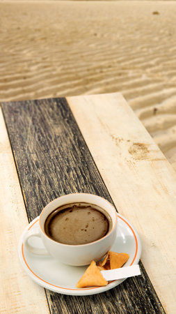 Cup of coffee on wooden background. International coffee day conceptの写真素材