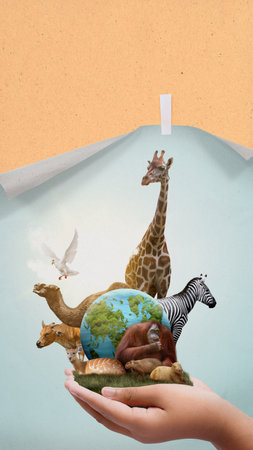 Human hand showing wildlife animal and earth. World Animal Day conceptの写真素材