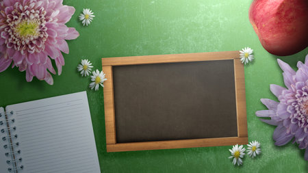Colorful flowers with an empty chalkboard on a colored background. Empty chalkboard for copy space. World Teacher Day conceptの写真素材