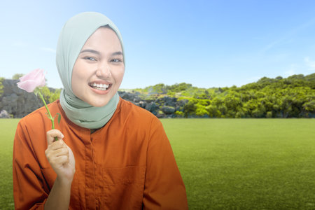 The girl in the veil showed a smiling expression. Happy smile face. World Smile Day conceptの写真素材