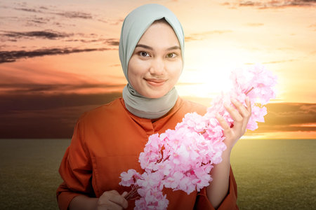 The girl in the veil showed a smiling expression. Happy smile face. World Smile Day conceptの写真素材